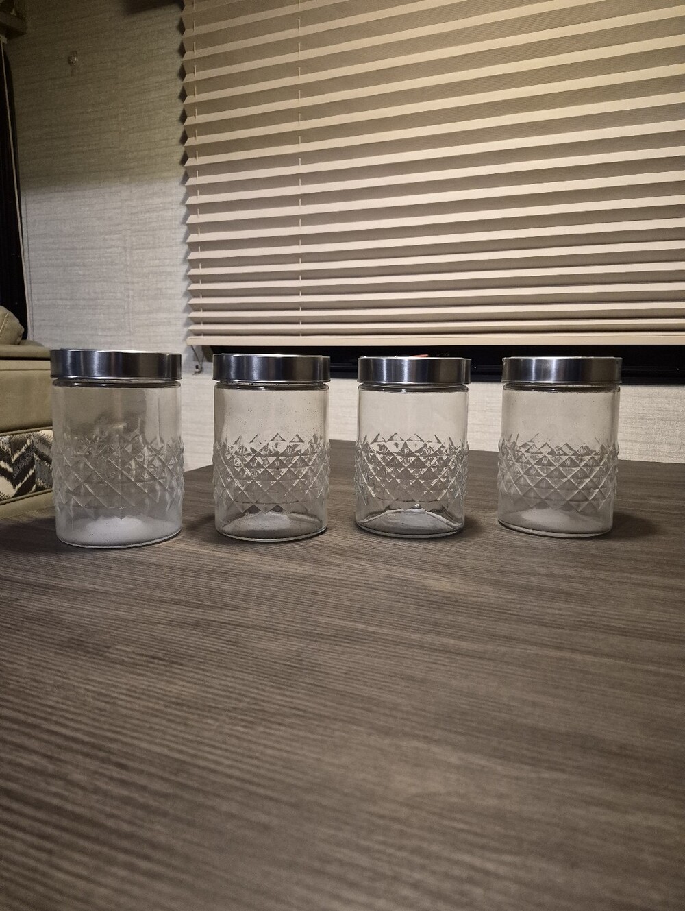 Set of 4 Clear Glass Canisters with Silver Lids
